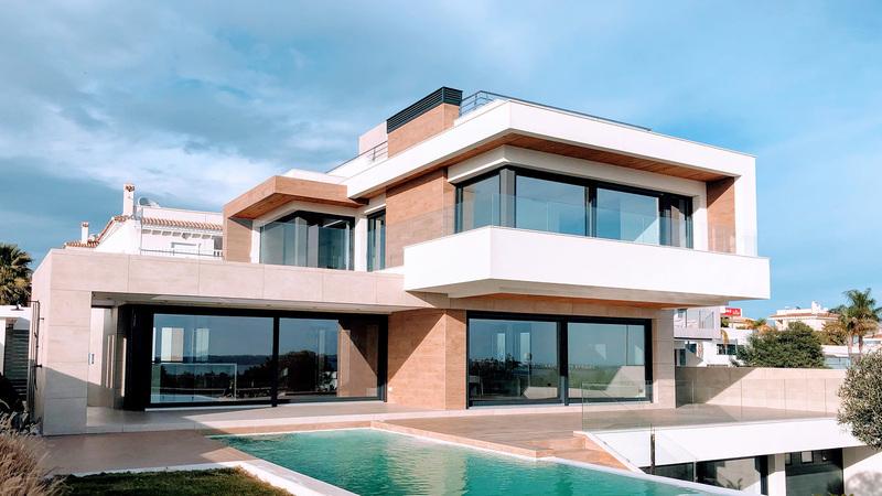 Mẫu nhà lắp ghép 2 tầng đẹp với thiết kế các ô vuông vức vững chãi