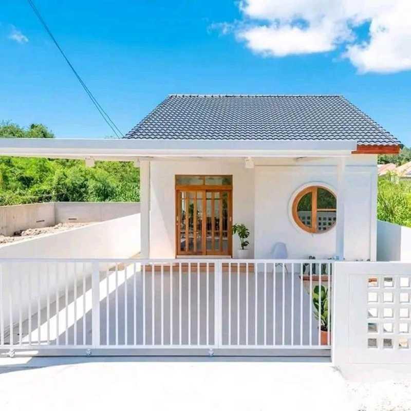 Nhà cấp 4 mái tôn giả ngói kết hợp tường sáng màu mang vẻ đẹp giản dị, gần gũi (Nguồn: Internet)